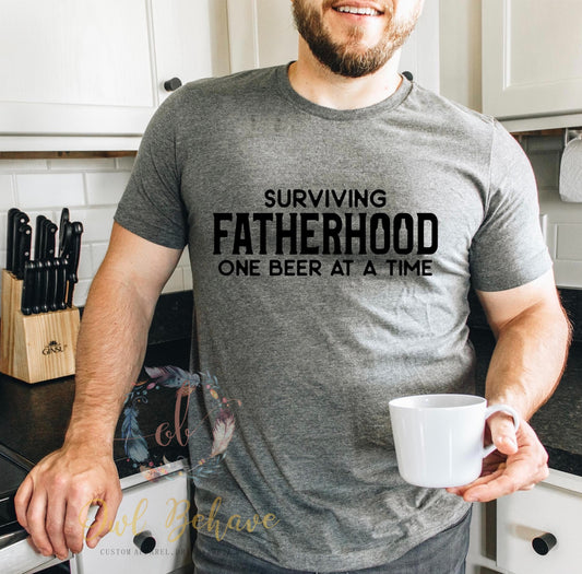 Surviving Fatherhood One Beer At A Time Adult T-shirt
